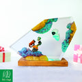 Handcrafted WALL-E and EVE epoxy resin lamp with boot plant on natural wood base