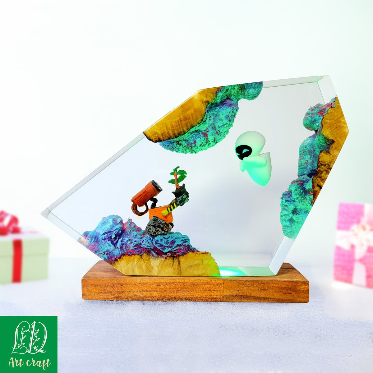 Handcrafted WALL-E and EVE epoxy resin lamp with boot plant on natural wood base